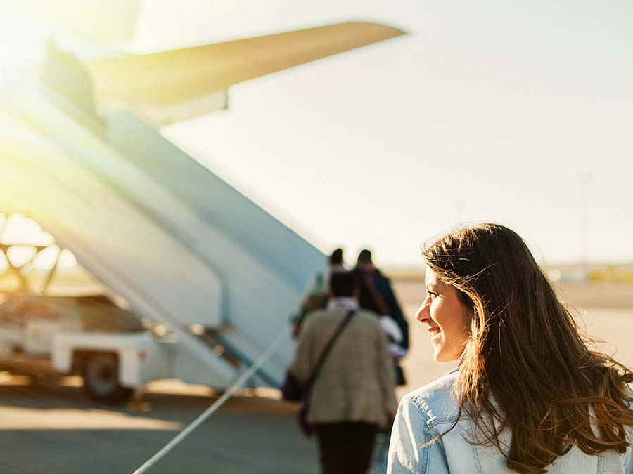 Woman boarding a flight